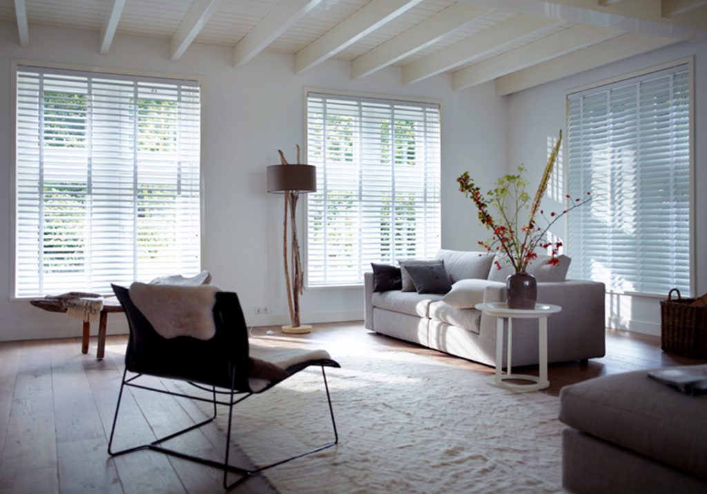 White Faux Wood Blinds in the living room
