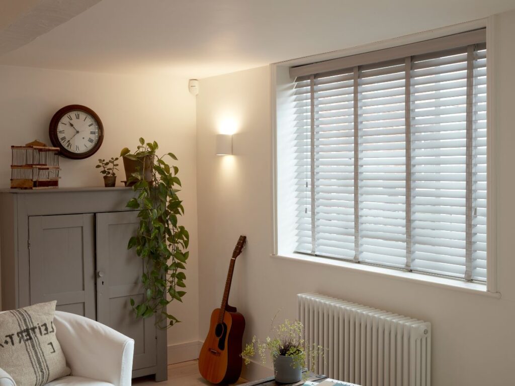 white wooden venetian blinds with tapes