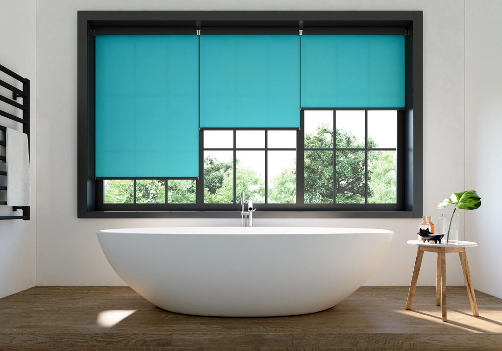 blue roller blind in a bathroom by Your Blinds Direct
